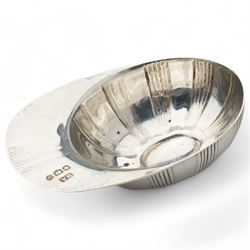   German silver novelty pepper pot in the form of a running chick, realistically modelled L8cm London 1922 Maker Berthold Hermann Muller and a silver jockeys cap caddy spoon Sheffield 1954 Maker Atkin Bros (2)