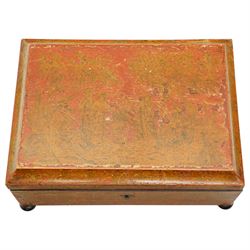 Regency red lacquered penwork box, of rectangular form on bun feet, decorated with classical figures in a landscape among foliate motifs, W28cm 