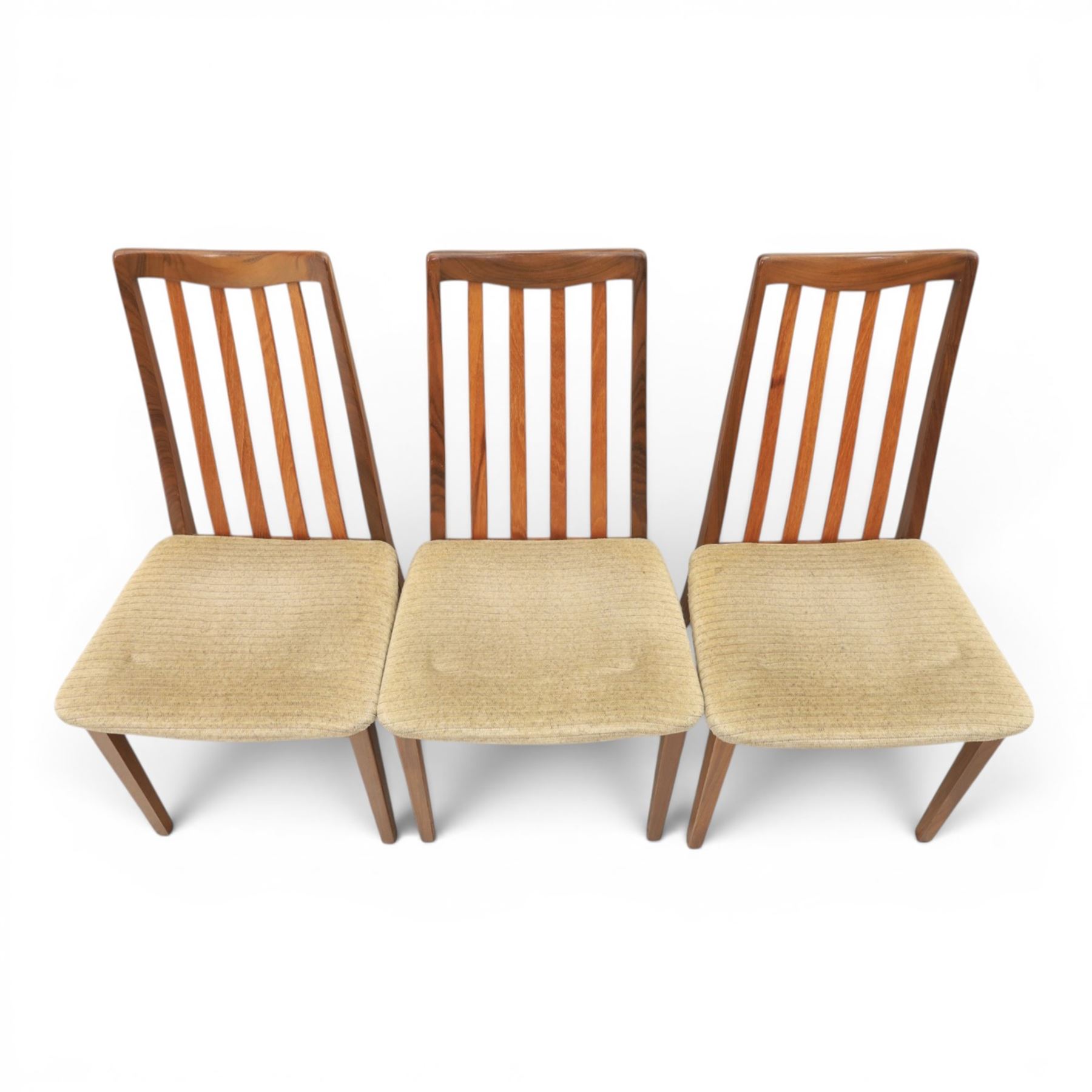 G-Plan - mid-20th century teak 'Fresco' circular extending dining table and six chairs, circular top with storable fold-over leaf extending to 166cm