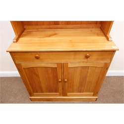  Light wood two tier plate rack dresser, single drawer above two cupboard doors, plinth base, W97cm, H198cm, D46cm  