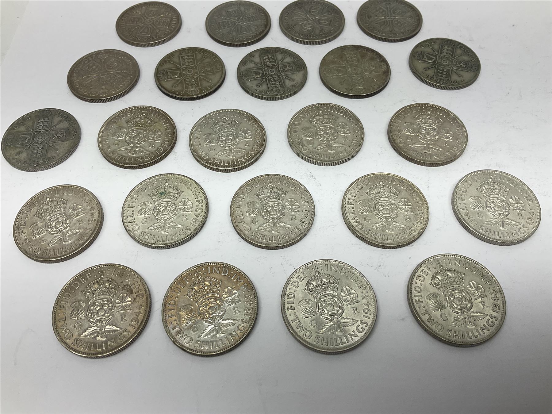 Approximately 260 grams of Great British pre 1947 silver two shillings coins 