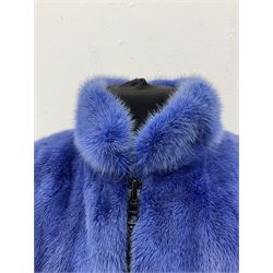 Modern cut lightweight skins lavender blue mink jacket, approx size 10 to 14, with elasticated cuffs, stand up small collar, black satin style lining, zip fastener, perfect condition as new, top class mink.
