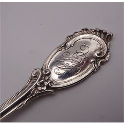 Early 20th century Danish silver flatware, comprising set of twelve table spoons and nine table forks, each embossed with scroll, foliate and floral decoration to handles, and engraved with monogram to terminals, with three-tower mark and dated 1904, maker's mark AM, assayer Christian F Heise
