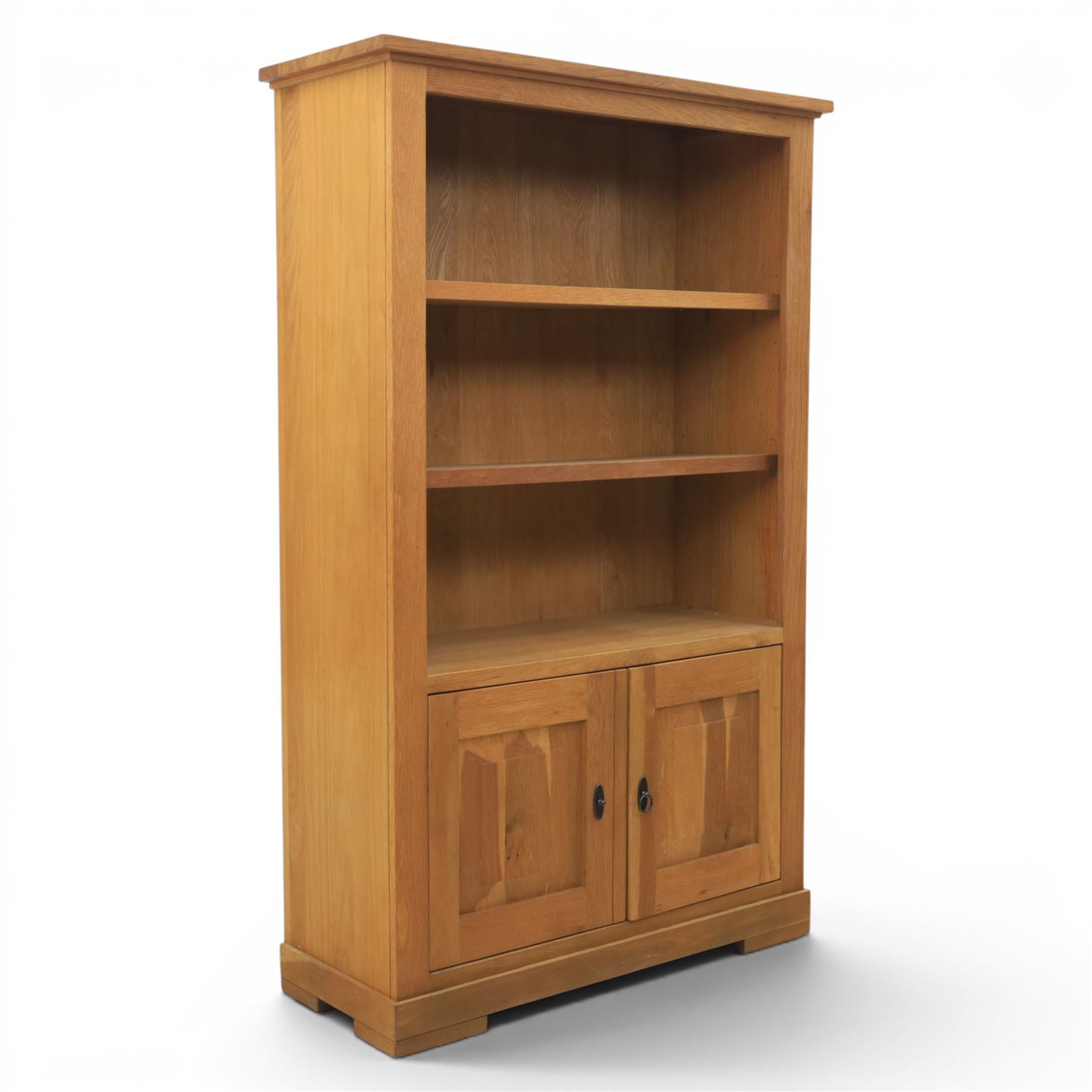 Light oak open bookcase fitted with three shelves, two cupboards, below