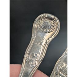 Seven silver Kings/Queens pattern dessert spoons, including George III Irish silver pair with engraved griffin crests, hallmarked Dublin 1818, maker's mark SI and five with varying dates and makers, all hallmarked 