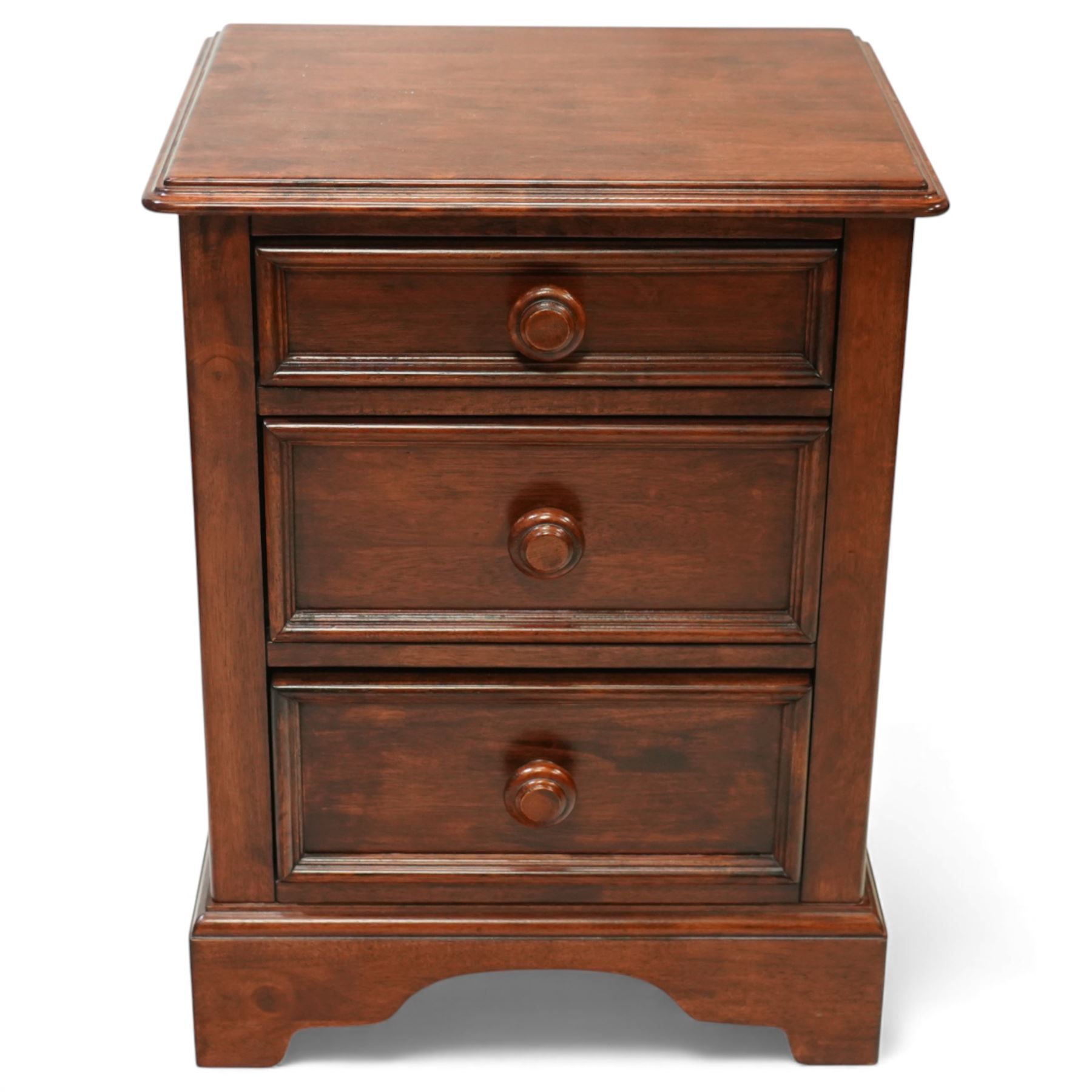 Willis & Gambier - three-drawer lamp chest, rectangular moulded top over three framed drawers with turned wooden knobs, raised on a shaped plinth base