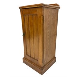 Edwardian ash bedside cabinet, single plank door