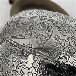 Late Victorian silver bachelors three piece tea service, comprising bullet shaped teapot, open sucrier and milk jug, each engraved with monogram surrounded by birds upon and amidst a blossoming vine, the teapot with scroll capped curved wooden handle and wooden finial to cover, hallmarked Wakely & Wheeler, London 1890, teapot including handle H12cm, sucrier H5.5cm 