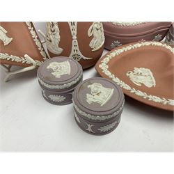 Collection of Wedgwood Jasperware, in orange, lilac and pink colourways, including oval tray, small jug, trinket boxes, trinket dishes, etc , all with impressed mark beneath