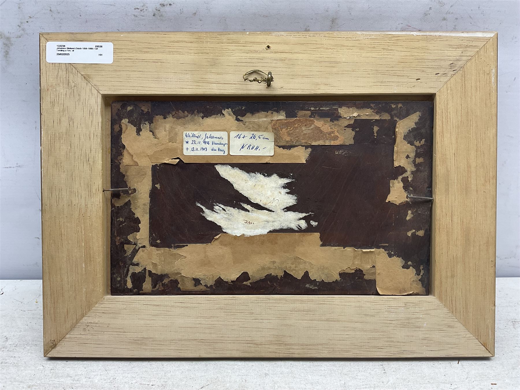 Johannes Weiland (Dutch 1856-1909): Girl Tending a Fire, oil on panel signed 14.5cm x 25cm 