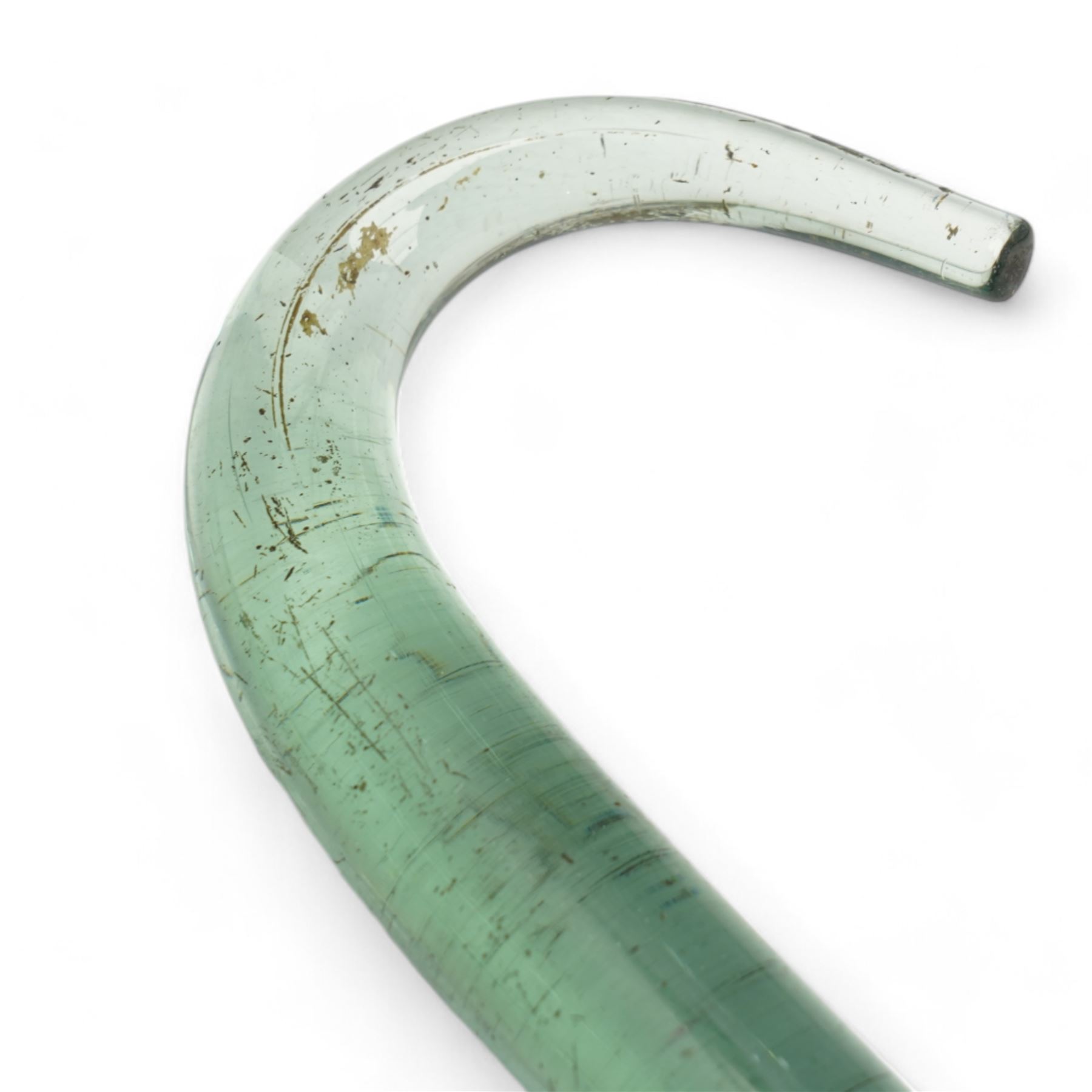 Five glass walking canes, including a Victorian cane with red helix twist pattern, shepherds crook, with barley twist decoration, amber glass and two others, max L155cm approx 