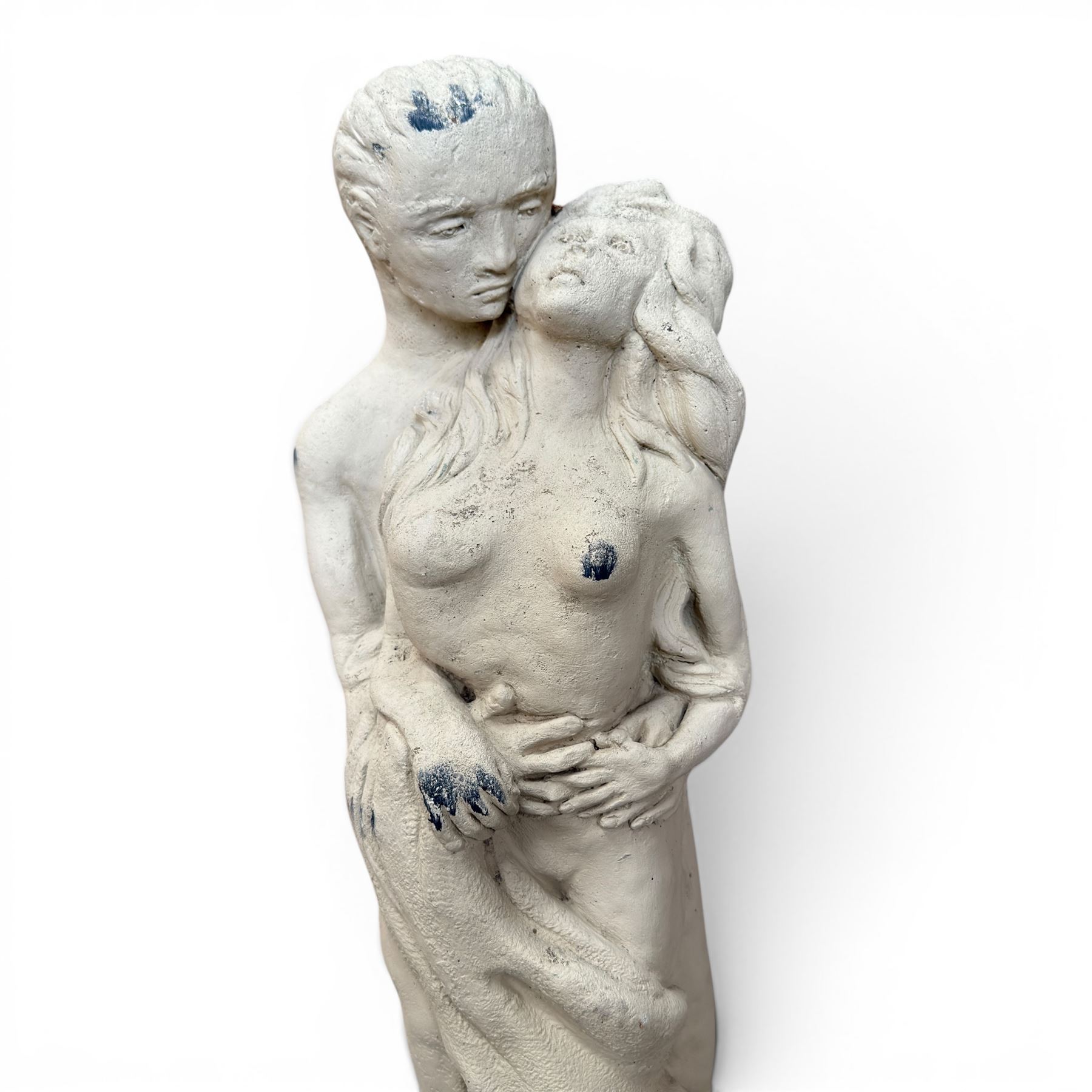 Pair of cast stone seat lions, male and female figure, and a miniature pair of cast stone lions