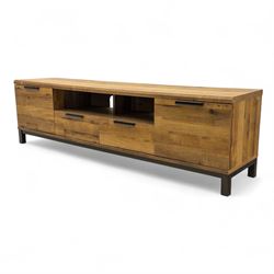 Pair of contemporary media sideboards, oak effect construction with inset handles, comprising two drawers and an open shelf flanked by cupboard doors, on metal supports (2)
