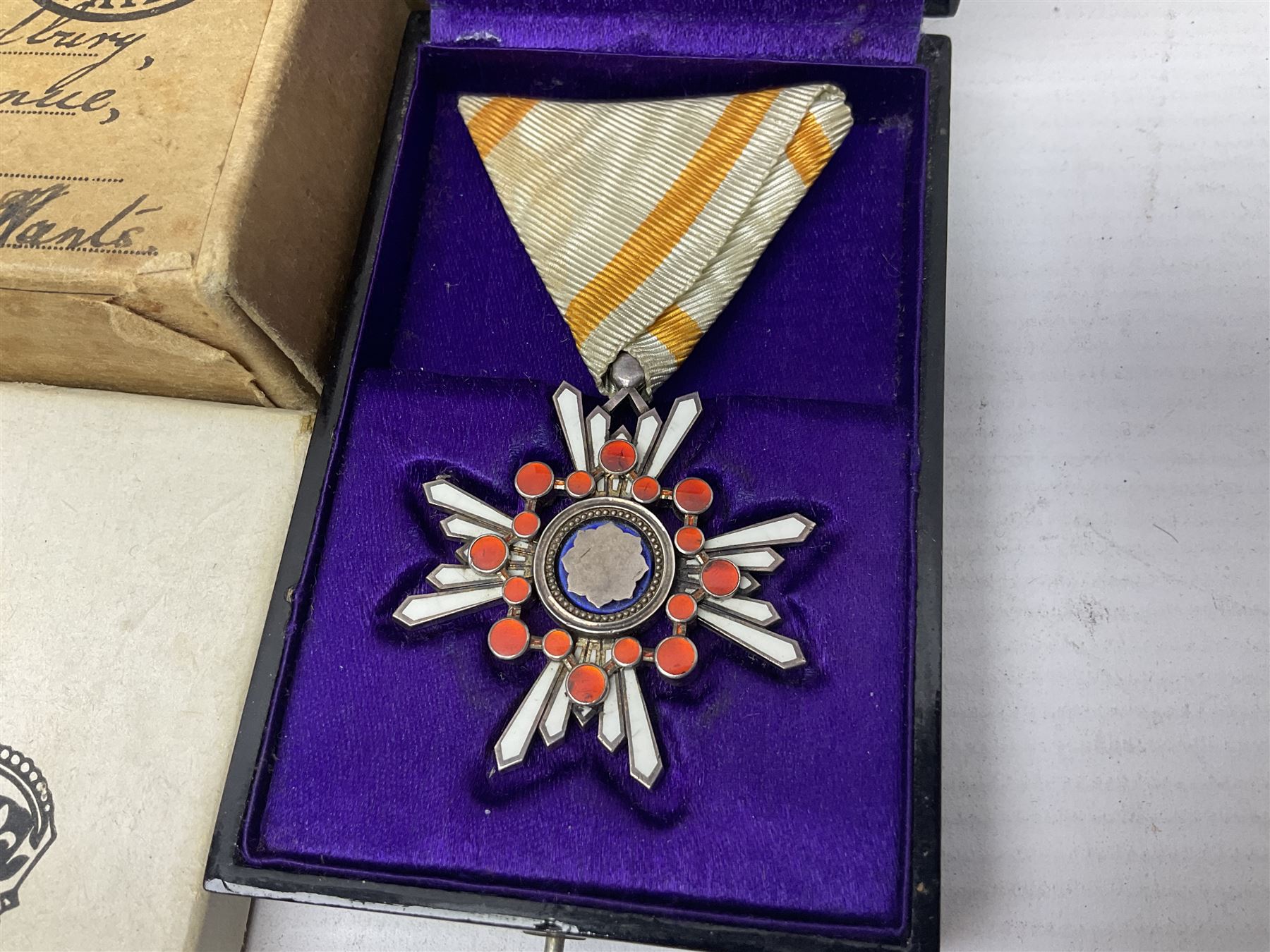Japanese Order of the Sacred Treasure Medal (Zaihosho) in lacquered box; Norwegian Grunnlovsdag 1945 Medal with National Flag ribbon; three school attendance medals; four Royalty commemorative medals including both Victoria jubilees; quantity of medal ribbons and medal bars; medal issue boxes; badges; booklets etc