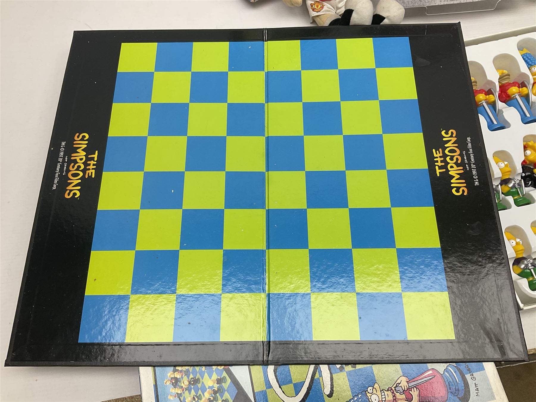 Three Mattel carded Harry Potter dolls - Harry, Hermione & Dumbledore; Vivid Imaginations Take That Robbie doll; all boxed; three Manchester United figures of players (one boxed); and The Simpsons 3-D Chess Game; boxed