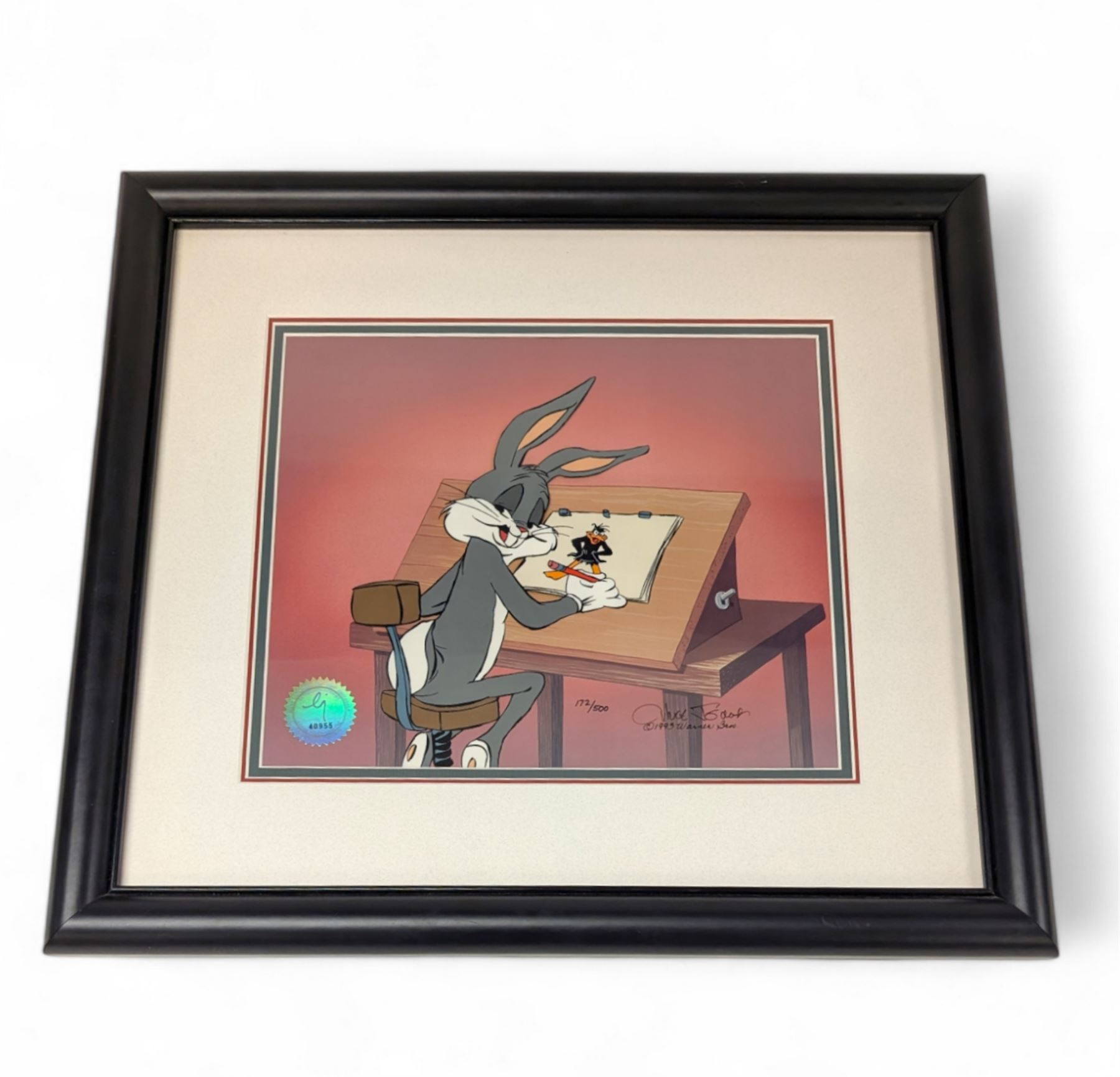 Limited edition 1993 Warner Bros animation art cel 'Ain't I A Stinker' signed by Chuck Jones, depicting Bugs Bunny drawing Daffy Duck,  limited edition 172/500, with Certificate of Authenticity, framed and glazed, frame H46cm