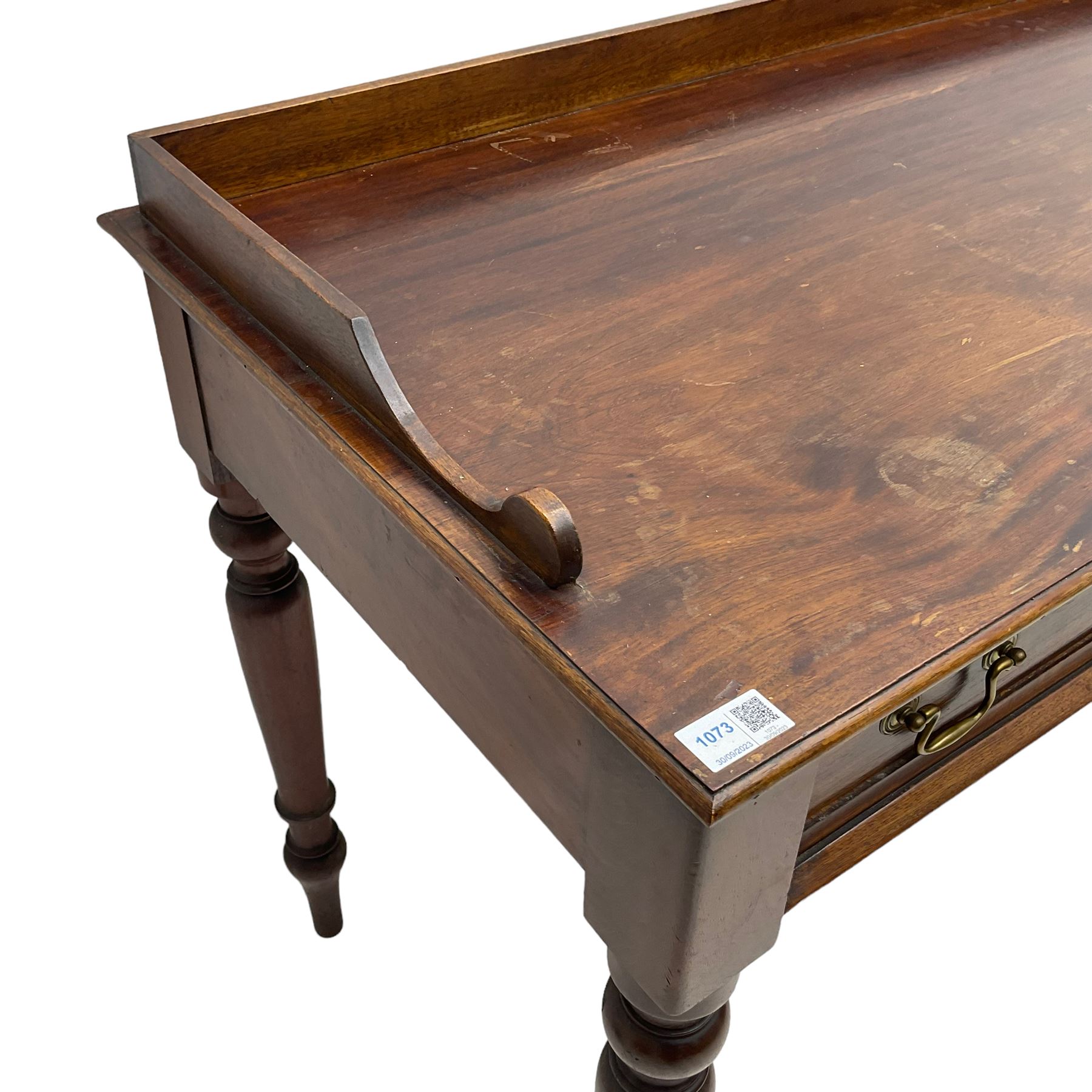 Victorian design mahogany washstand, raised back over rectangular moulded top, fitted with two drawers, on turned supports