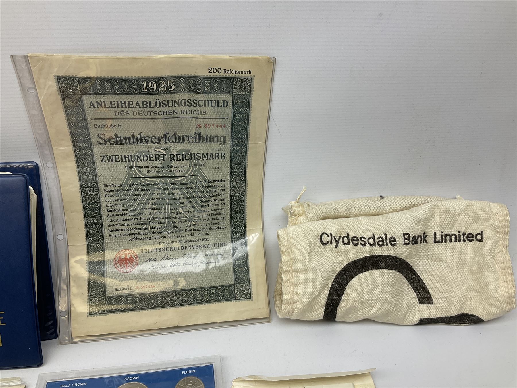 Great British and World coins, including Canadian 1975 dollar, United States of America 1975 proof set and bicentennial silver uncirculated set 1776-1976, Queen Elizabeth II Gibraltar 1977 sterling silver proof twenty-five pence, cased with certificate, New Zealand 1979seven coin set in blue wallet,  GB pre-decimal coins etc