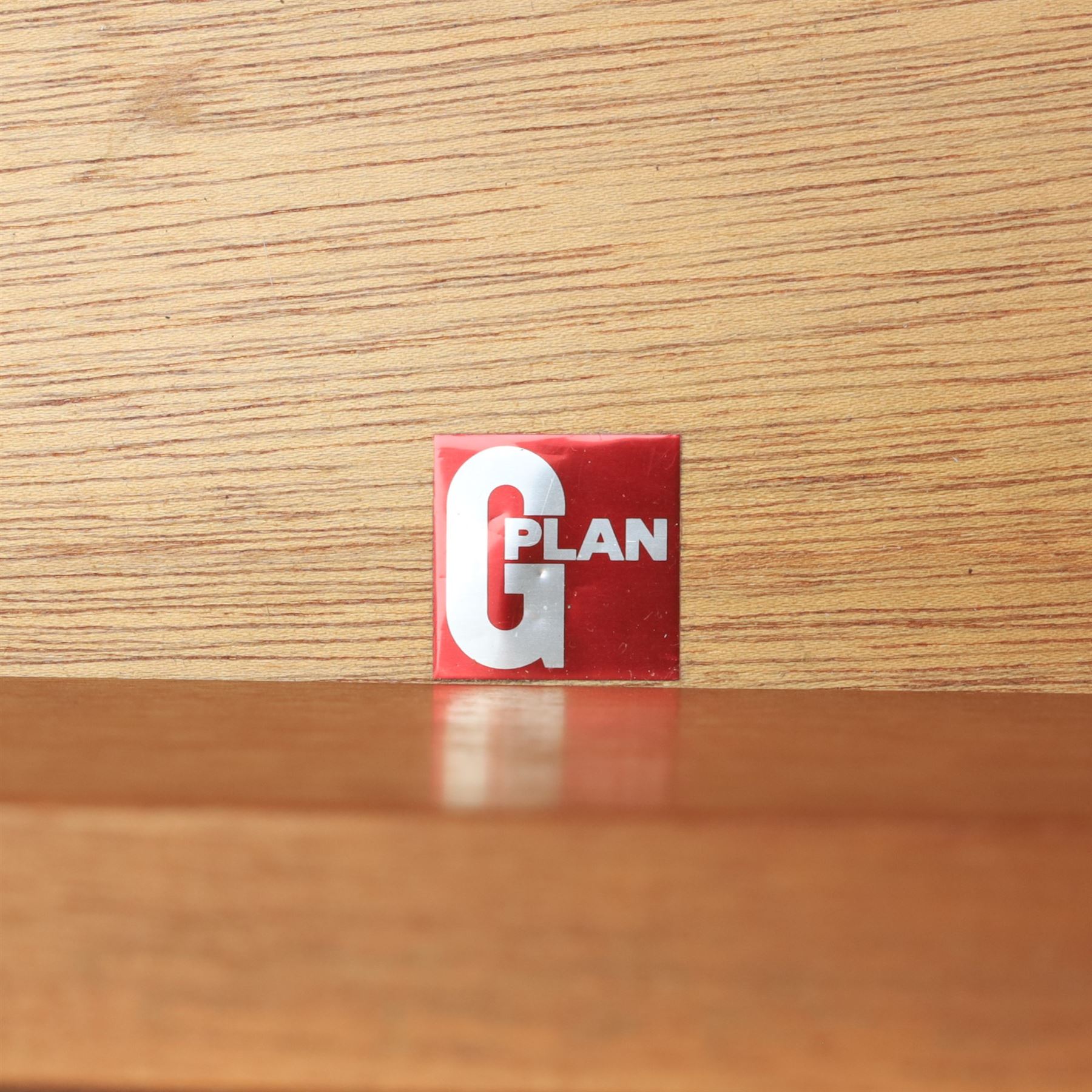 G Plan - 'Fresco' chest of drawers and mirrored dresser, chest of drawers with six drawers, dresser with four graduating drawers and swing mirror surrounded in teak, both raised on a recessed plinth base
Chest H 99cm, W 53cm, D 45cm
Dresser H 136cm, W 72cm, D 48cm