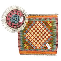 Chobi Kilim mat (50cm x 51cm), and a circular Mori Jaldar mat (D27cm)