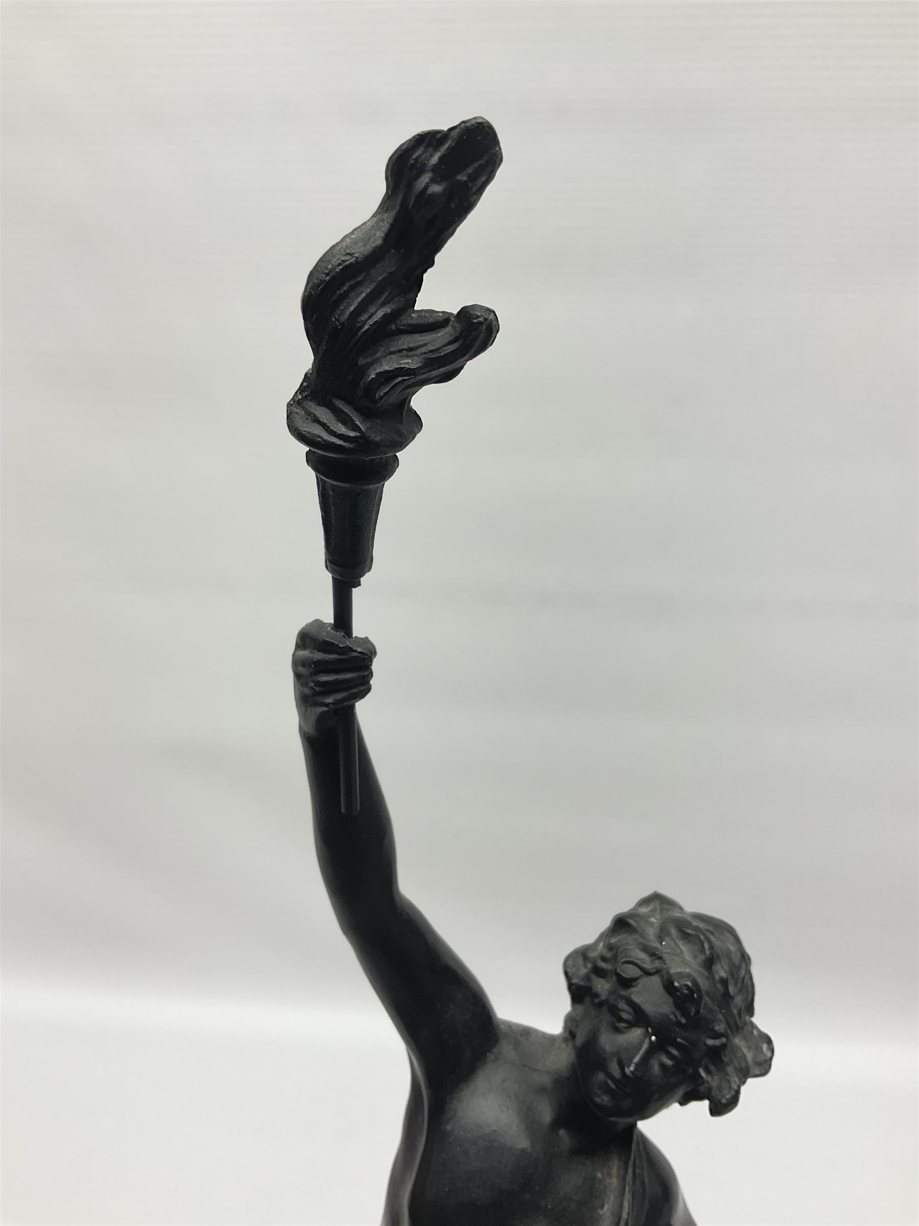 Pair of spelter figures, Le Force and Le Pouvoir, modeled as figures standing on lions, arms held aloft, H51cm 