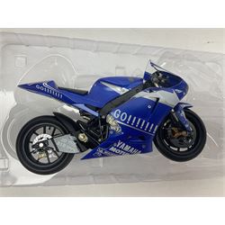 Three Minichamps 1:12 scale die-cast models of motorcycles - Suzuki GSX-R1000 Team Alstare Suzuki Corona Extra Troy Corser WSB 2005; Yamaha YZR-M1 Gauloises Yamaha Team Colin Edwards MotoGP Laguna Seca 2005; and Honda NSR 500 Loris Capirossi MotoGP 2002; all boxed (3)