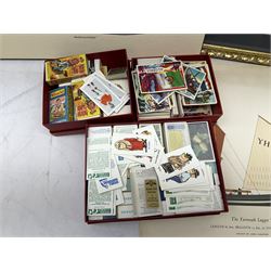 Set of four framed coloured prints humorous fire brigade related, after Chris Reynolds, together with Brooke bond picture cards, to include Asian wild life, the race into space, travel through the ages etc