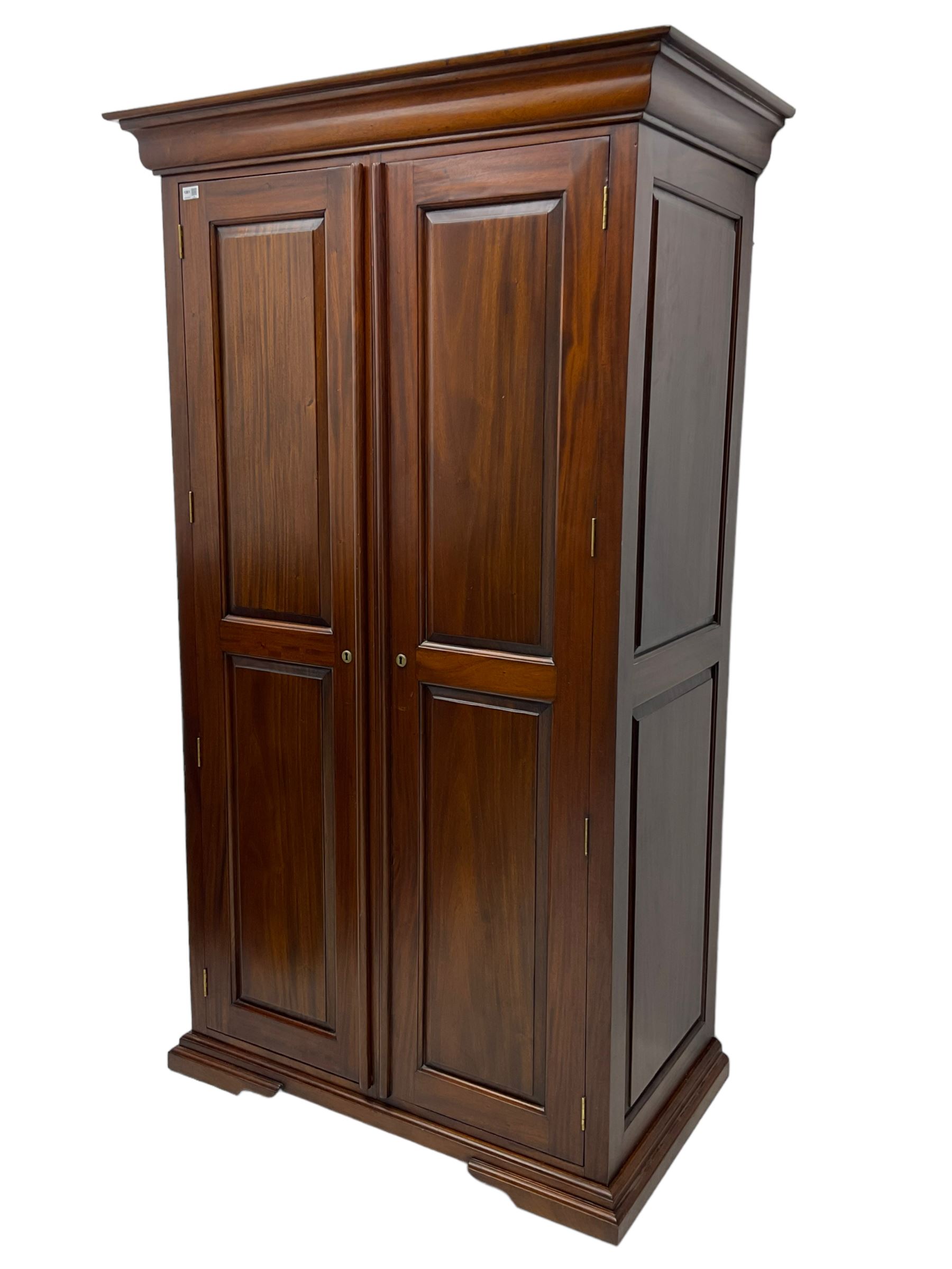 Barker & Stonehouse - 'Grosvenor' mahogany double wardrobe, projecting cornice over two panelled doors and panelled sides, on bracket feet