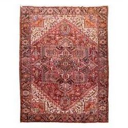North West Persian Heriz hand-knotted carpet, brick red field, with large central angular ...