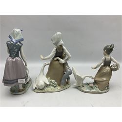 Three Lladro figures, comprising Arecely with Pet Ducks no 5202, Avoiding the Goose no 5033 and Aggressive Goose no 1288, all with original boxes, largest example H25cm