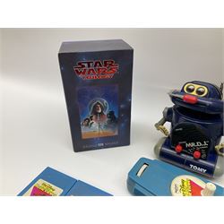 Matchbox 'The Thunderbirds' limited edition Commemorative Set, boxed with paperwork; Tomy 'Mr. D.J.' blue plastic robot radio; Mettoy Walt Disney Movie Viewer with three cassettes; and 1995 boxed set of the Star Wars trilogy VHS video tapes