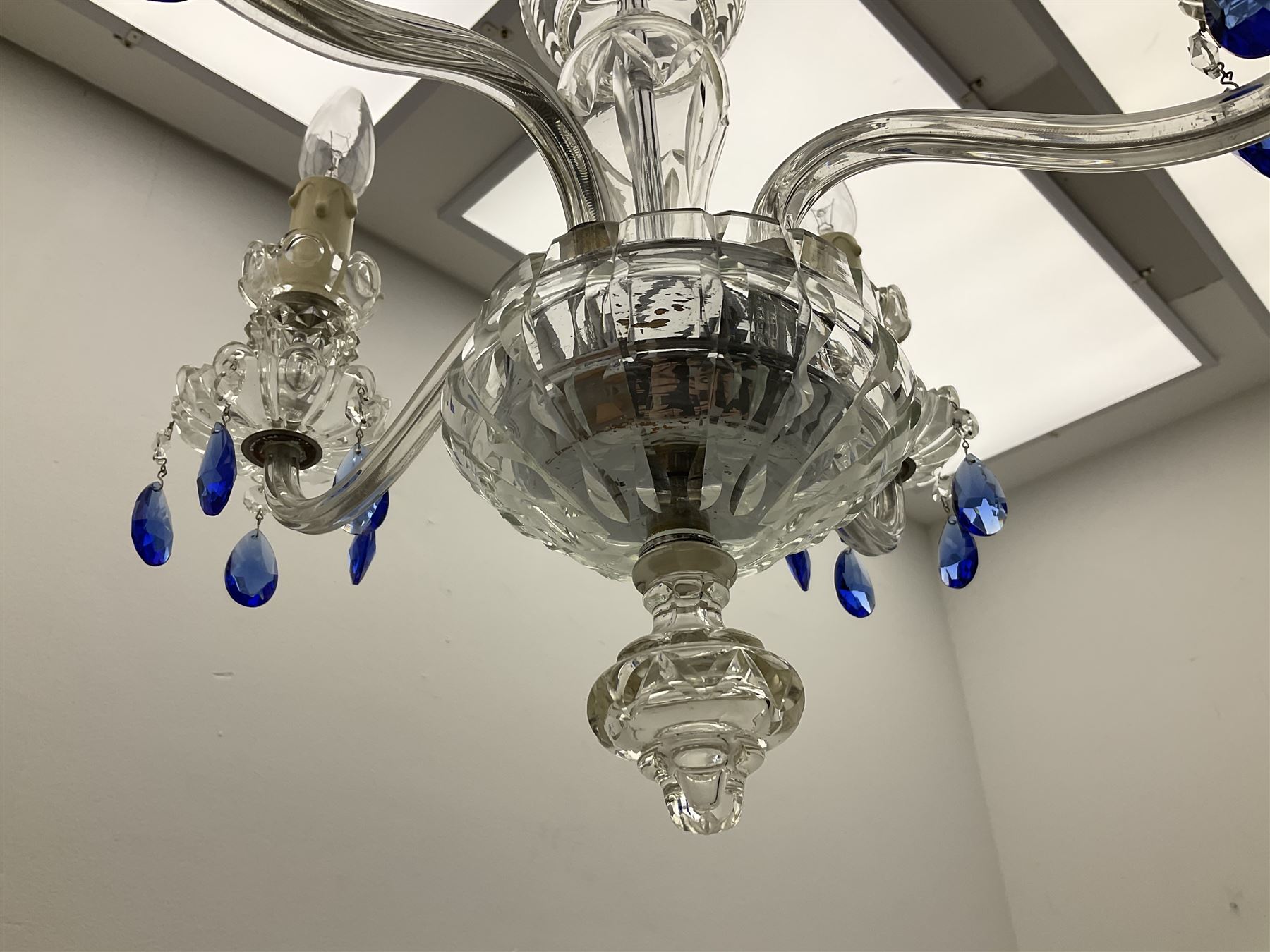 Glass four light chandelier, the baluster shaped central glass column supporting four curved branches with drip pans and blue glass drops, approx height excl fitting H50cm