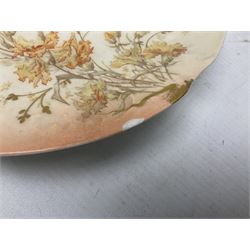 Early 20th century Limoges part tea service, decorated with floral sprays and gilt on merging peach and white ground, comprising six teacups, twelve side plates, six smaller plates, milk jug, open sucrier, slop bowl and two cake plates, many marked R Delinieres Limoges D&C France to base