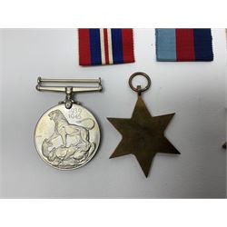 Twelve WW2 medals comprising four 1939-1945 war medals, four Defence medals, three 1939-1945 Stars and Africa Star; all with ribbons; some as groups in two issue boxes with slips