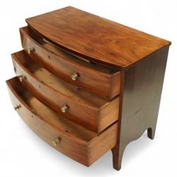 Late George III mahogany bow-fronted chest, the moulded top over three long graduating drawers fitted with turned brass knobs and brass-lined escutcheons, the shaped apron and splayed bracket supports