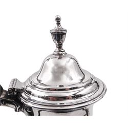 George III silver coffee pot, of bellied form with scroll detail to spout, urn finial to the hinged cover and wooden scroll handle, upon a stepped circular foot, hallmarked Hester Bateman, London 1788, H31.5cm, approximate gross weight 27.97 ozt (870 grams)