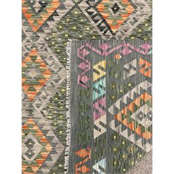 Kilim grey and green ground rug, overall geometric design decorated with lozenges