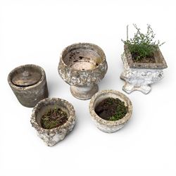 Five composition stone garden planters, comprising various circular and square forms with relief foliate decoration, together with a cylindrical lidded garden pot.