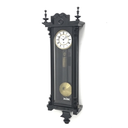Early 20th century Vienna type regulator wall clock in ebonised case, circular Roman enamel dial with subsidiary seconds dial, single weight driven movement, H113cm
