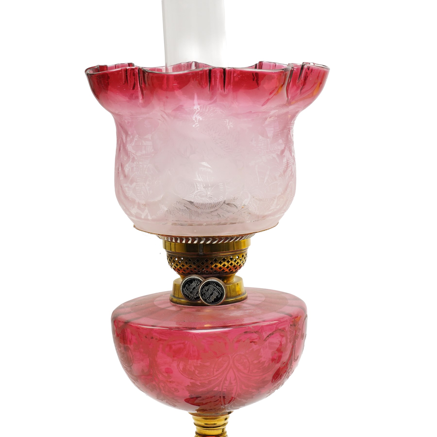 Victorian table oil lamp with floral painted yellow glass reservoir on brass column, another with cranberry glass reservoir and shade and another with painted green glass reservoir (3)