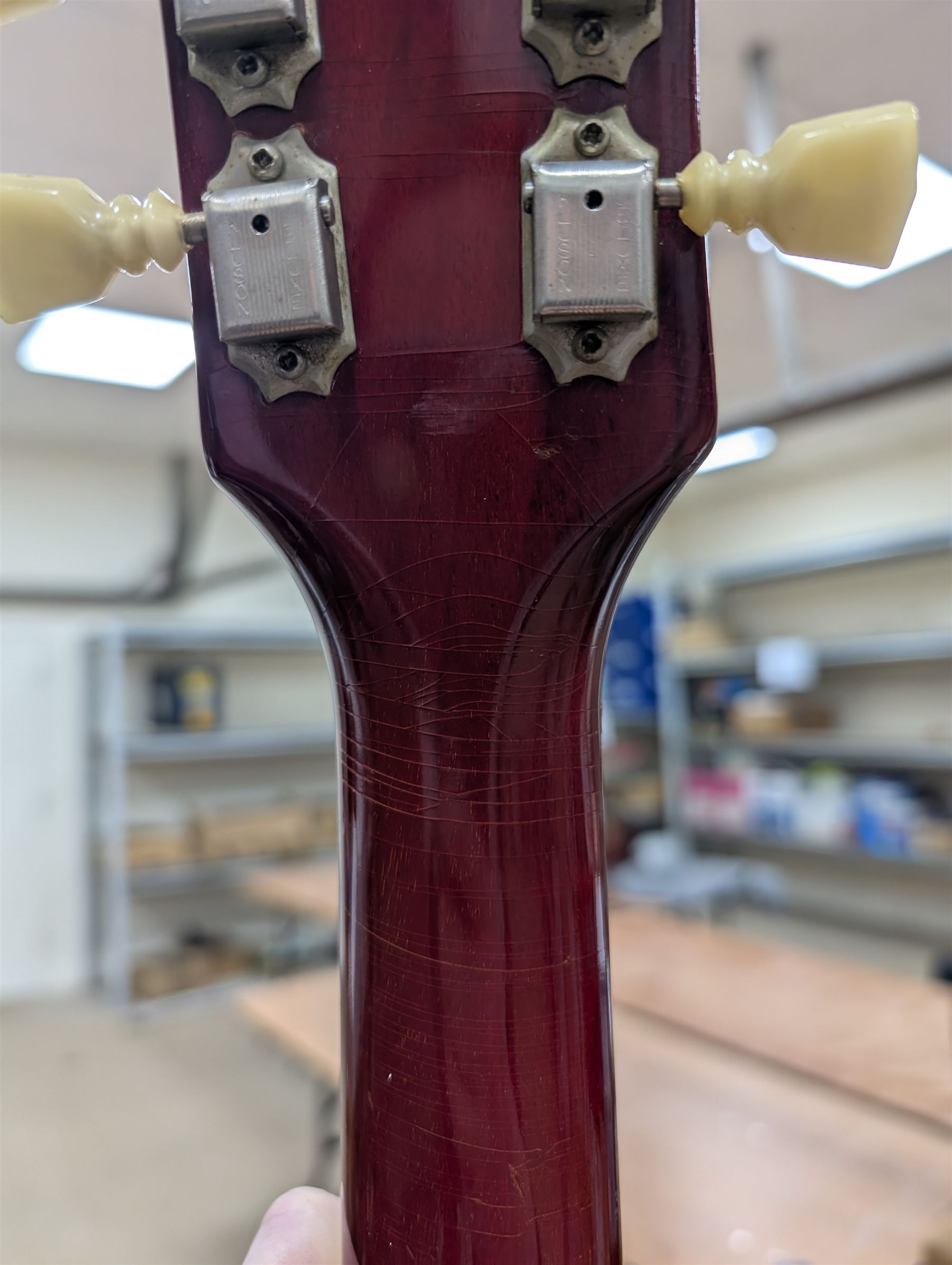1967 Gibson ES-335 TDC electric guitar, in cherry red finish, made in USA, semi-hollow body, mother of pearl fret markers, original pick guard, original tuning pegs, contained within period hard case made in Philadelphia USA with orange velvet lining, guitar length L104cm