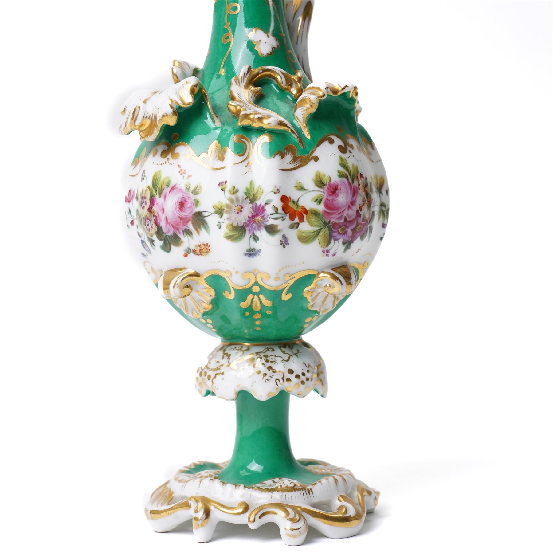 Pair of mid-19th century Jacob Petit ewers, in the Rococo Revival style, hand-painted with panels of flowers on a green ground and heightened profusely with gilt, JP mark in underglaze blue to base, H25cm