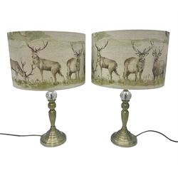Pair of table lamps, with fabric shades decorated with deer, in a water colour style, H47cm, shades D30cm