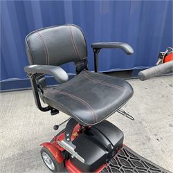 Four wheel electric mobility scooter in orange with keys and charger  - THIS LOT IS TO BE COLLECTED BY APPOINTMENT FROM DUGGLEBY STORAGE, GREAT HILL, EASTFIELD, SCARBOROUGH, YO11 3TX