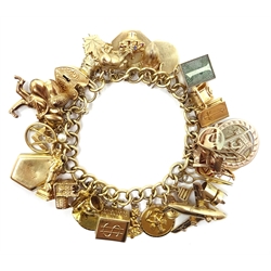  9ct gold 31 charm bracelet with nineteen 9ct gold charms, hallmarked, seven gold charms, stamped 14K/14ct,  one 10K charm, three unmarked charms and one 9ct front and back, approx  84.6gm   