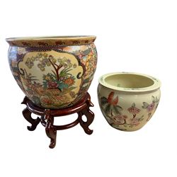 20th century Oriental fish bowl jardinière, decorated with reserves of birds amongst flowe...