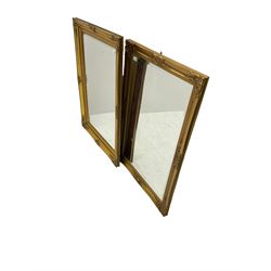 Near pair gilt mirrors, rectangular bevelled plate, framed moulded with foliate decoration