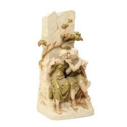Royal Dux figure of seated male and female figures drinking by a well with gilded decoration H37cm