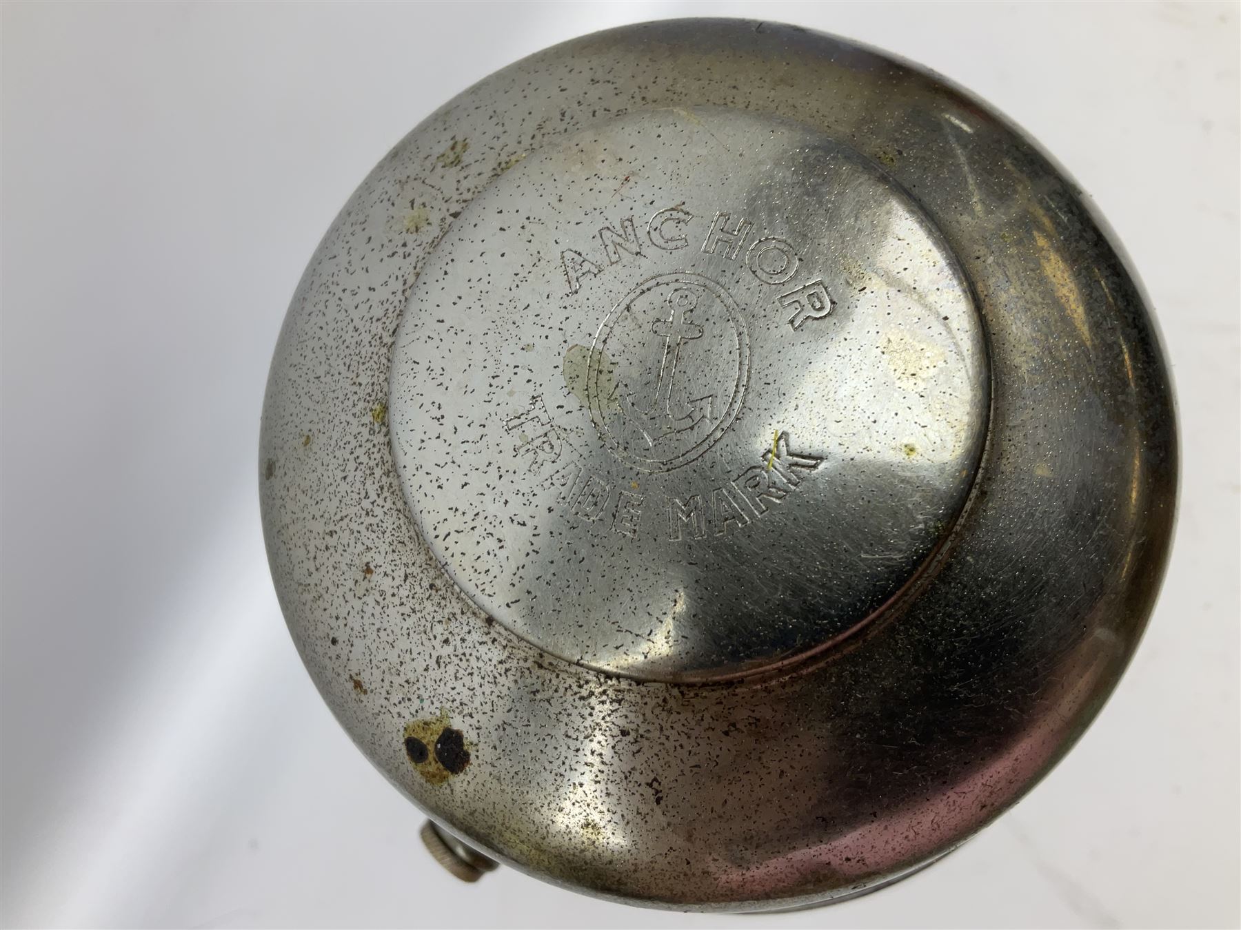 Copper and brass ship’s lamp marked ‘Anchor’, H25cm, Feuer hand storm lantern, Bialaddin Model 315 paraffin lamp and an Anchor lamp (4)