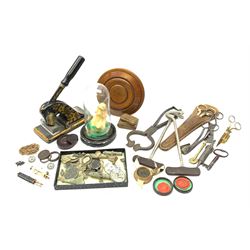 A group of assorted collectables, to include two silver buttons, hallmarked Birmingham 1900, Stanhope pendant in the form of a pig, two turquoise inset etuis (lacking covers), sugar loaf cutters, wick trimmers, pastry wheel, selection of metal detector finds, red wax document seals, one example in circular rosewood box, two treen snuff boxes, riding boot hooks, leather cased tailors scissors, wax model of a praying figure within a glass dome, letter head stamp press, etc. 